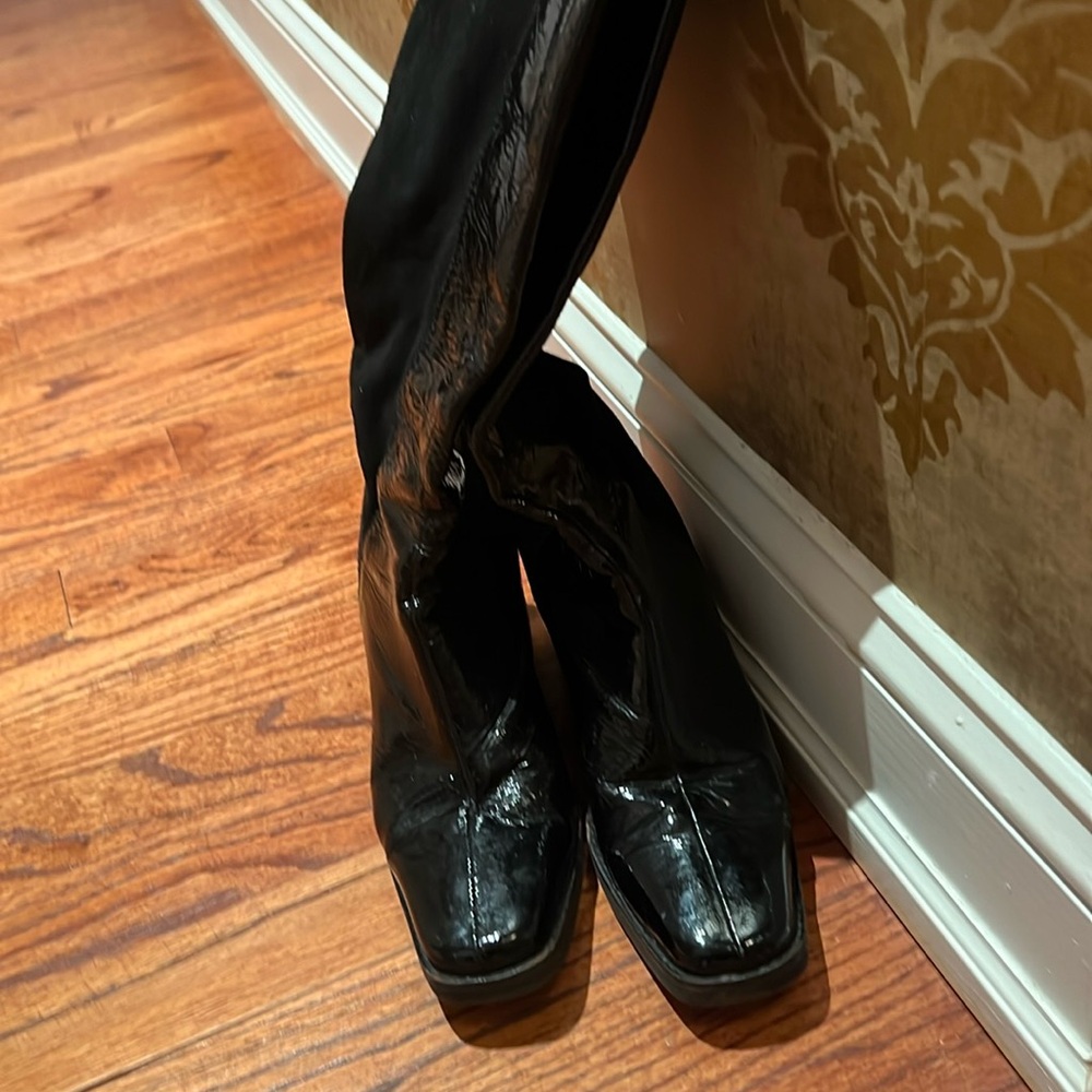 Black paten leather pull on boots
